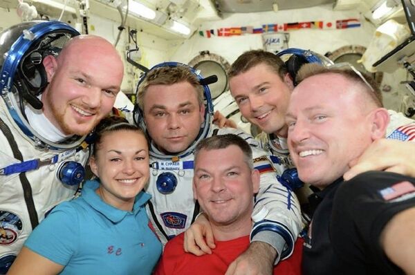 ESA astronaut Alexander Gerst, Roscosmos cosmonaut Elena Serov, Maxim Shur, Alexander Samokutyaev, NASA astronauts Reid Wiseman and Barry Wilmore (left to right) on board the ISS ESA astronaut Alexander Gerst, Roscosmos cosmonaut Elena Serov, Maxim Shur, Alexander Samokutyaev, NASA astronauts Reid Wiseman and Barry Wilmore (left to right) on board the ISS - Sputnik International