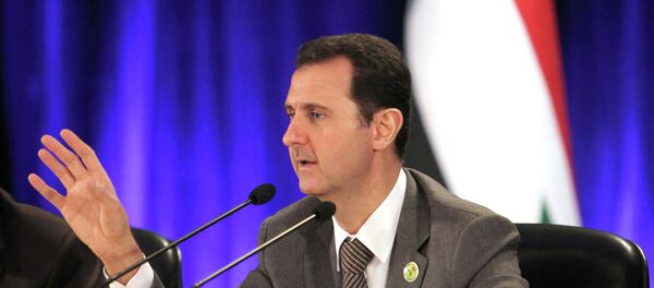 A handout picture released by the official Syrian Arab News Agency (SANA) and taken in Damascus - Sputnik International