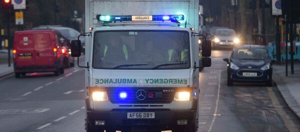 An ambulance carrying a female Ebola patient arrives at the Royal Free Hospital in London - Sputnik International