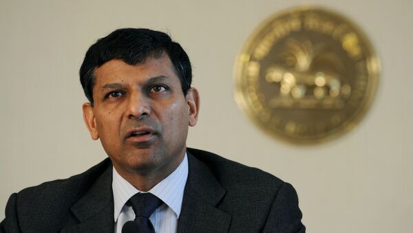 Reserve Bank of India (RBI) governor Raghuram Rajan announces the first bi-monthly Monetary Policy Statement 2014-15 at the RBI headquarters in Mumbai on April 1, 2014 - Sputnik International