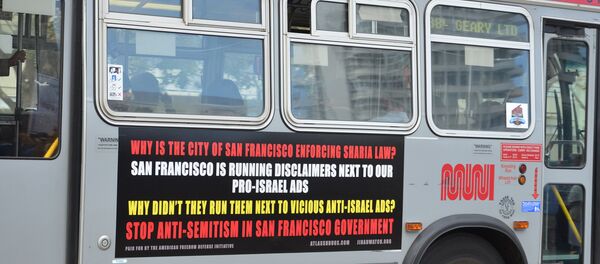 As many as 50 San Francisco buses now feature controversial ads equating Islam with Nazism and showing an image of Adolf Hitler and Haj Amin al-Husseini, a 20th Century Palestinian Muslim leader who opposed Zionism, with the words, Islamic Jew-Hatred: It’s In The Quran. As many as 50 San Francisco buses now feature controversial ads equating Islam with Nazism and showing an image of Adolf Hitler and Haj Amin al-Husseini, a 20th Century Palestinian Muslim leader who opposed Zionism, with the words, Islamic Jew-Hatred: It’s In The Quran. - Sputnik International