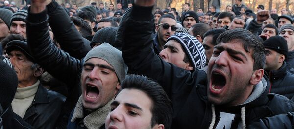 Armenian protesters shout slogans in front of the prosecutor's office in Gyumri as they demand Russian soldier Valery Permyakov accused of murdering a family of six be delivered to Armenian justice authorities for trial Armenian protesters shout slogans in front of the prosecutor's office in Gyumri as they demand Russian soldier Valery Permyakov accused of murdering a family of six be delivered to Armenian justice authorities for trial - Sputnik International