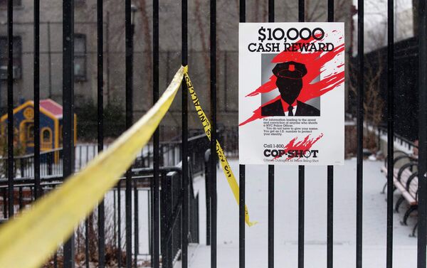 A sign posted near the site of a shooting is seen in the Bronx borough of New York January 6, 2015 - Sputnik International