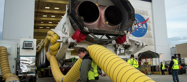 An Orbital Sciences Corporation Antares rocket is seen as it is rolled out to launch Pad-0A at NASA's Wallops Flight Facility, Wallops Island, Va., Sunday, Jan. 5, 2014 An Orbital Sciences Corporation Antares rocket is seen as it is rolled out to launch Pad-0A at NASA's Wallops Flight Facility, Wallops Island, Va., Sunday, Jan. 5, 2014 - Sputnik International