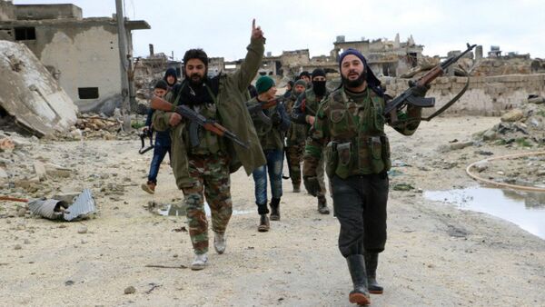 Opposition fighters walk in the al-Breij area northwest on the northern Syrian city of Aleppo - Sputnik International