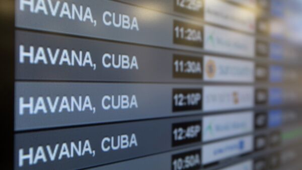 Charter flights from Miami to Havana are shown on a departures monitor at Miami International Airport, Friday, Jan. 16, 2015 in Miami - Sputnik International