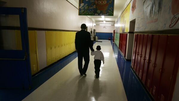 More than 50 percent of American students attending the nation's public schools live in poverty - Sputnik International