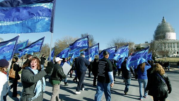 Law enforcement and family members march during a “Sea of Blue” pro-police rally near the Capitol in Washington on Saturday, Jan. 17, 2015 - Sputnik International