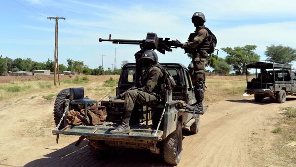 Cameroonian soldiers patrol in Amchide, northern Cameroon, 1 km from Nigeria - Sputnik International