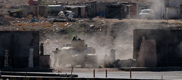 A vehicle from the Presidential Protection Forces is positioned on a street during clashes near the Presidential Palace in Sanaa A vehicle from the Presidential Protection Forces is positioned on a street during clashes near the Presidential Palace in Sanaa - Sputnik International
