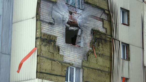 A residential building near Donetsk railway station damaged in the result of shelling by the Ukrainian army - Sputnik International