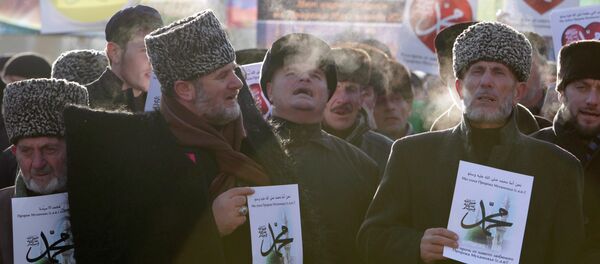 People attend a rally to protest against satirical cartoons of prophet Mohammad, in Grozny, Chechnya People attend a rally to protest against satirical cartoons of prophet Mohammad, in Grozny, Chechnya - Sputnik International