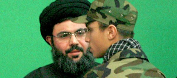 Jihad Moughniyah (R), son of Lebanon's Hezbollah late military leader Imad Moughniyah, greets Sayyed Hashem Safieddine, head of Hezbollah's Executive Council, as they attend a ceremony marking a week of his father's death in Beirut's suburbs in this February 22, 2008 file photo. Jihad Moughniyah (R), son of Lebanon's Hezbollah late military leader Imad Moughniyah, greets Sayyed Hashem Safieddine, head of Hezbollah's Executive Council, as they attend a ceremony marking a week of his father's death in Beirut's suburbs in this February 22, 2008 file photo. - Sputnik International