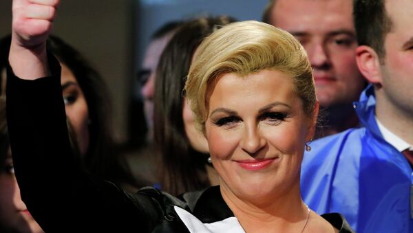 Kolinda Grabar-Kitarovic of the opposition HDZ celebrates her victory in Croatia's presidential run-off election on the stage at her campaign headquarters in Zagreb January 11, 2015. - Sputnik International