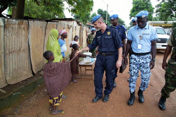 MINUSCA Police Commissioner on Foot Patrol in Bangui MINUSCA Police Commissioner on Foot Patrol in Bangui - Sputnik International