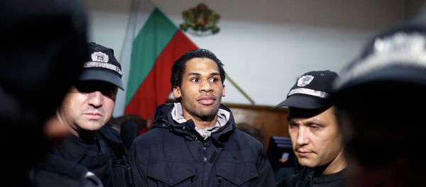 French citizen Fritz-Joly Joachin (C) arrives under police escort in front of a court in the southern city of Haskovo January 20, 2015. - Sputnik International