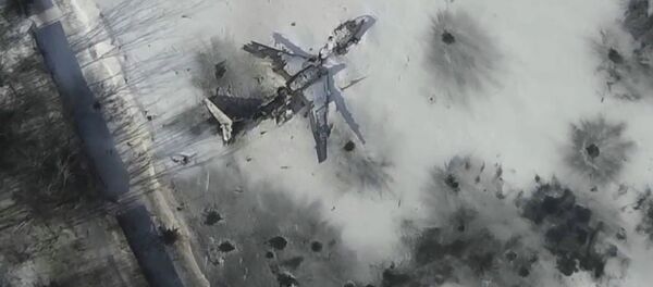 An aerial footage shot by a drone shows an outline of an airplane in the snow at the Sergey Prokofiev International Airport damaged by shelling during fighting between pro-Russian separatists and Ukrainian government forces, in Donetsk, eastern Ukraine An aerial footage shot by a drone shows an outline of an airplane in the snow at the Sergey Prokofiev International Airport damaged by shelling during fighting between pro-Russian separatists and Ukrainian government forces, in Donetsk, eastern Ukraine - Sputnik International
