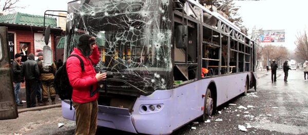 Bus fired at a stop of public transport in Leninsky district of Donetsk - Sputnik International