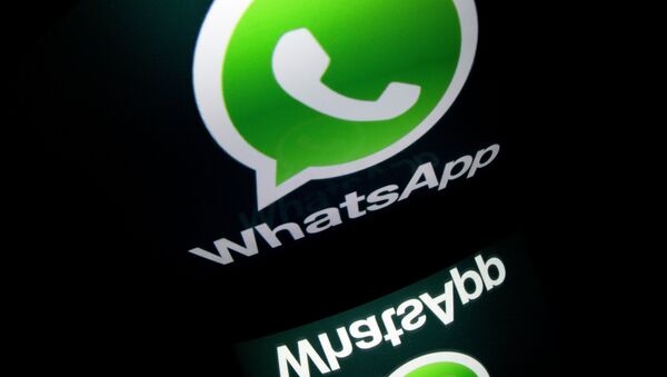 The logo of mobile app WhatsApp is displayed on a tablet - Sputnik International