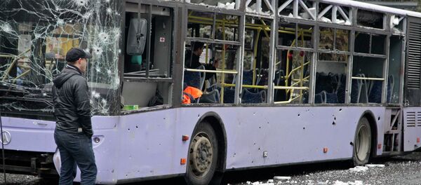 A view shows a damaged trolleybus in Donetsk, January 22, 2015 A view shows a damaged trolleybus in Donetsk, January 22, 2015 - Sputnik International