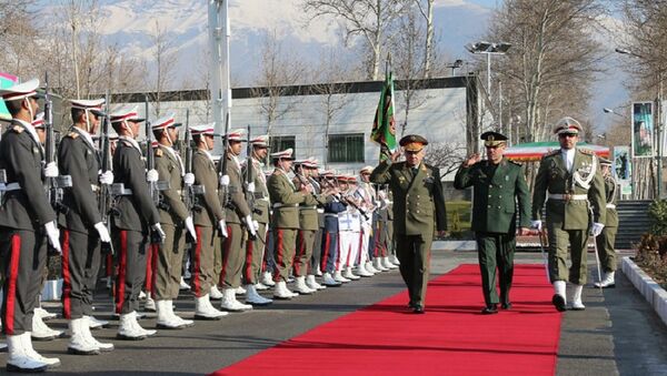 Russian Defense Minister Sergei Shoigu, third right, and Hossein Dehghan, second right, Brigadier General and Minister of Defense of Iran, meet in Tehran - Sputnik International