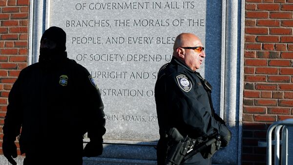 Police officers stand outside the federal courthouse in Boston for the first day of jury selection in the trial of Boston Marathon bombing suspect Dzhokhar Tsarnaev - Sputnik International