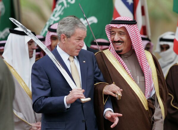 President Bush stands with Saudi Prince Salman, right, brother of Saudi King Abdullah, while watching a traditional sword dance at the Al Murabba Palace and Natural History Museum in Al Janadriyah, Saudi Arabia, Tuesday, Jan. 15, 2008 President Bush stands with Saudi Prince Salman, right, brother of Saudi King Abdullah, while watching a traditional sword dance at the Al Murabba Palace and Natural History Museum in Al Janadriyah, Saudi Arabia, Tuesday, Jan. 15, 2008 - Sputnik International