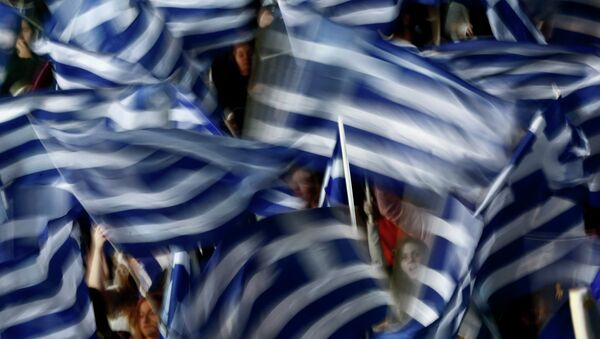 Supporters of Greece's Prime Minister Antonis Samaras wave Greek flags - Sputnik International
