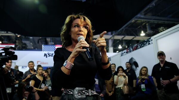 Former Alaska Gov. Sarah Palin speaks to a crowd during an event to promote her television show, Amazing America with Sarah Palin, at the Shooting, Hunting and Outdoor Trade Show, Thursday, Jan. 22, 2015, in Las Vegas - Sputnik International