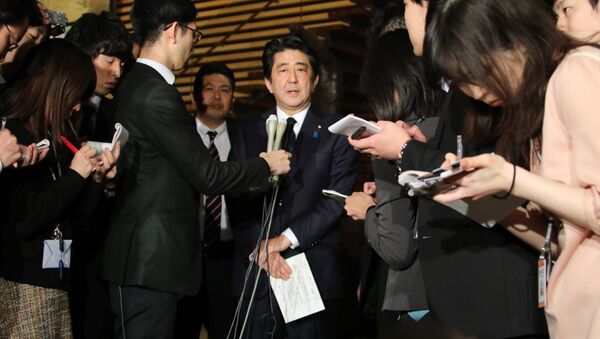Japanese Prime Minister Shinzo Abe speakes to reporters after a cabinet meeting at his official residence in Tokyo on January 25, 2015 - Sputnik International