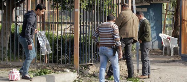 Egyptian security officials inspect the site of a bomb blast near the Alf Maskan district of Cairo, January 25, 2015 Egyptian security officials inspect the site of a bomb blast near the Alf Maskan district of Cairo, January 25, 2015 - Sputnik International