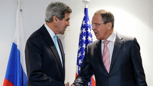 US Secretary of State John Kerry (L) and Russian Foreign Minister Sergei Lavrov shake hands during a bilateral on the side line of an Organization for Security and Cooperation in Europe (OSCE) ministerial meeting on December 4, 2014 - Sputnik International