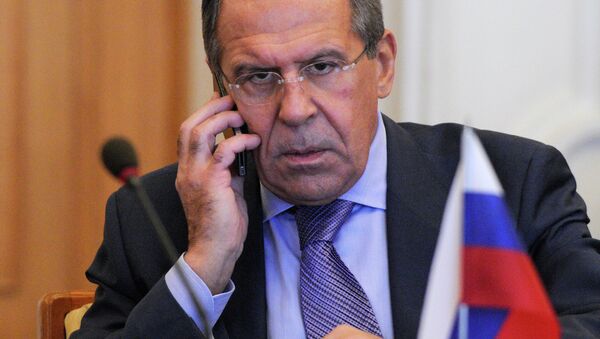 Russian Foreign Minister Sergey Lavrov speaks on the phone - Sputnik International