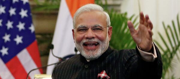 U.S. President Barack Obama stands next to Indian Prime Minister Narendra Modi (R) waving as they leave after giving their opening statement at Hyderabad House in New Delhi January 25, 2015 U.S. President Barack Obama stands next to Indian Prime Minister Narendra Modi (R) waving as they leave after giving their opening statement at Hyderabad House in New Delhi January 25, 2015 - Sputnik International