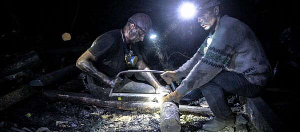 Miners strengthening a mine tunnel at the Glubokaya mine in Shakhtyorsk. Miners strengthening a mine tunnel at the Glubokaya mine in Shakhtyorsk. - Sputnik International