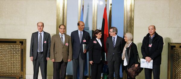 Special Representative of the U.N. Secretary-General for Libya and Head of United Nations Support Mission in Libya (UNSMIL) Bernardino Leon (3rd R) poses with Civil Society Representatives and former members of the National Transitional Council, for a group photograph after a news conference at the Palais des Nations in Geneva Special Representative of the U.N. Secretary-General for Libya and Head of United Nations Support Mission in Libya (UNSMIL) Bernardino Leon (3rd R) poses with Civil Society Representatives and former members of the National Transitional Council, for a group photograph after a news conference at the Palais des Nations in Geneva - Sputnik International