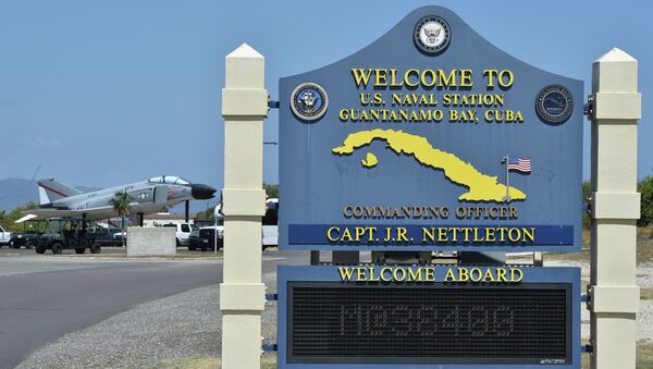 This photo reviewed by the US military and made during an escorted visit shows a welcome board at the road to the US Naval Station in Guantanamo Bay, Cuba - Sputnik International