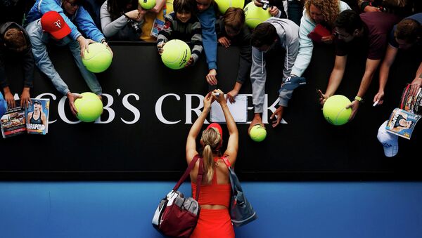Maria Sharapova of Russia signs autographs after defeating Eugenie Bouchard of Canada in their women's singles quarter-final match at the Australian Open 2015 tennis tournament in Melbourne - Sputnik International