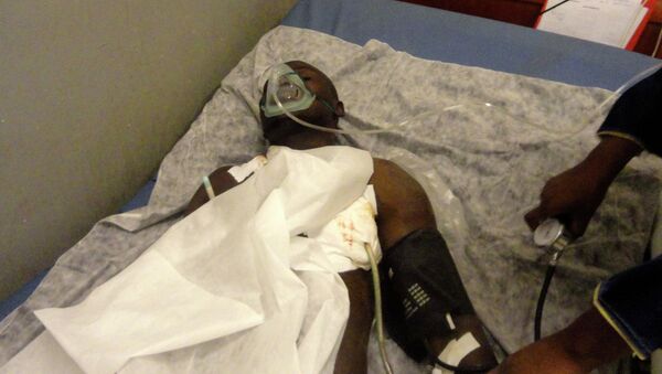 An injured man receives treatment in the main hospital in Gao - Sputnik International