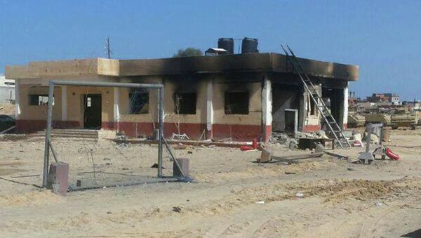 A damaged building is seen at a location where an attack took place on security forces in North Sinai, January 30, 2015 - Sputnik International