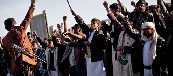 Houthi Shiite Yemenis chant slogans during a rally to show support for their comrades in Sanaa, Yemen, Wednesday, Jan. 28, 2015 Houthi Shiite Yemenis chant slogans during a rally to show support for their comrades in Sanaa, Yemen, Wednesday, Jan. 28, 2015 - Sputnik International