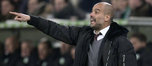 Bayern Munich coach Pep Guardiola shouts to his players during their German first division Bundesliga soccer match against VfL Wolfsburg, in Wolfsburg January 30, 2015 Bayern Munich coach Pep Guardiola shouts to his players during their German first division Bundesliga soccer match against VfL Wolfsburg, in Wolfsburg January 30, 2015 - Sputnik International