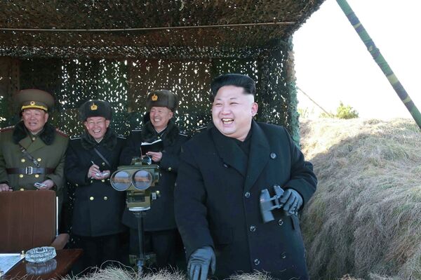 North Korean leader Kim Jong Un (R) laughs as he watches a drill by the Korean People's Army (KPA) for hitting enemy naval target at undisclosed location in this undated photo released by North Korea's Korean Central News Agency (KCNA) in Pyongyang January 31, 2015 North Korean leader Kim Jong Un (R) laughs as he watches a drill by the Korean People's Army (KPA) for hitting enemy naval target at undisclosed location in this undated photo released by North Korea's Korean Central News Agency (KCNA) in Pyongyang January 31, 2015 - Sputnik International