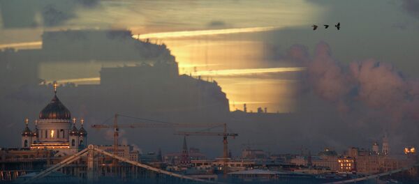 The Cathedral of Christ the Saviour, as seen from Andreyevsky Pedestrian Bridge in Moscow - Sputnik International