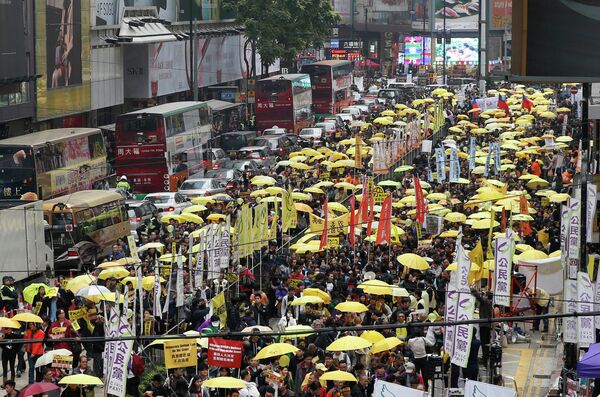 Thousands of activists take part in a democracy march to Central, demanding for universal suffrage in Hong Kong Sunday, Feb. 1, 2015 - Sputnik International