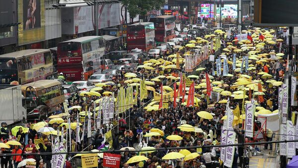 Thousands of activists take part in a democracy march to Central, demanding for universal suffrage in Hong Kong Sunday, Feb. 1, 2015 - Sputnik International