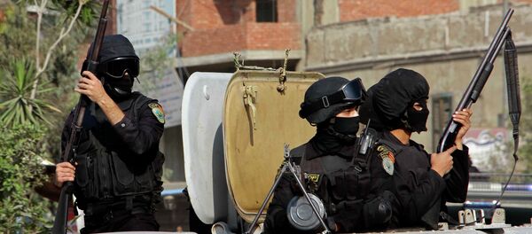 Masked Egyptian security forces deploy in the Cairo suburb of Matareya Masked Egyptian security forces deploy in the Cairo suburb of Matareya - Sputnik International