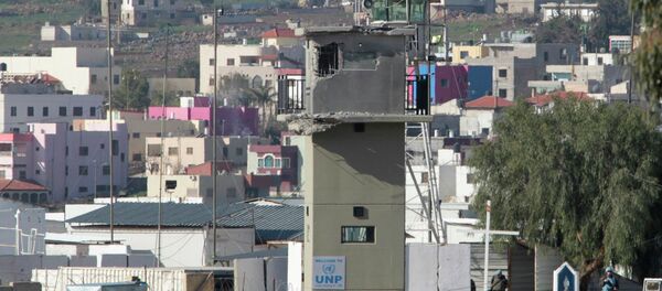 An observer tower damaged during Wednesday's exchange of fire between militant Islamist group Hezbollah and Israel - Sputnik International