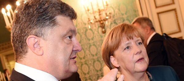 Petro Poroshenko and Angela Merkel Petro Poroshenko and Angela Merkel - Sputnik International