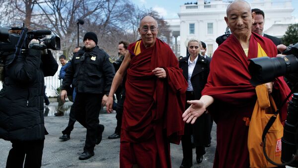 The Dalai Lama leaves the White House in Washington, Thursday, Feb. 18, 2010, following a meeting with President Barack Obama. - Sputnik International